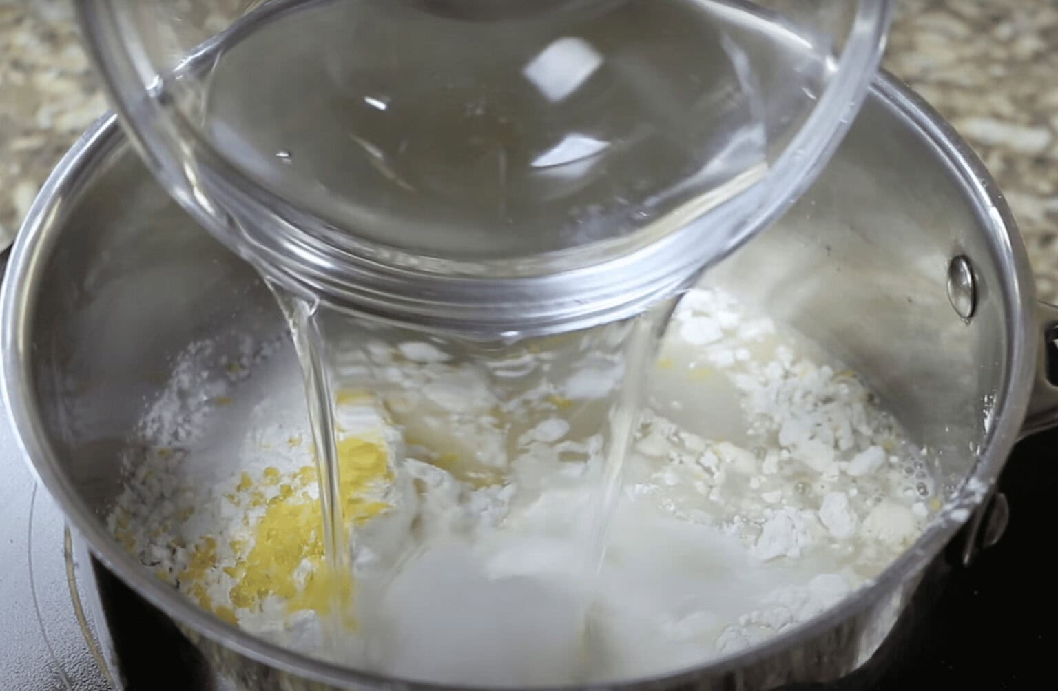 preparing filling for lemon meringue pie